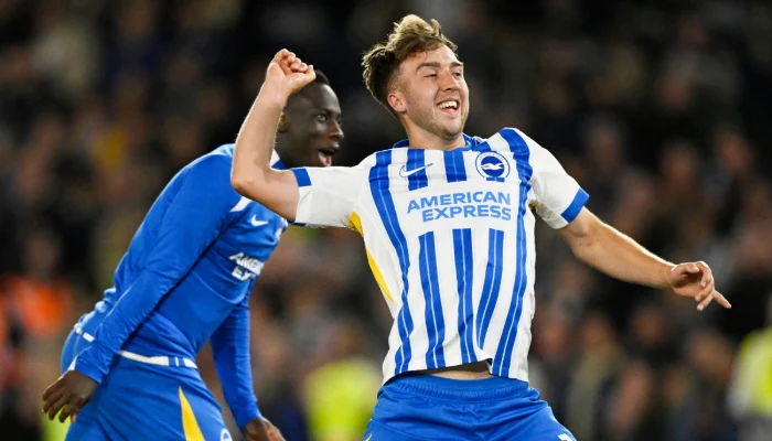 Yankuba Minteh and Jack Hinshelwood celebrate